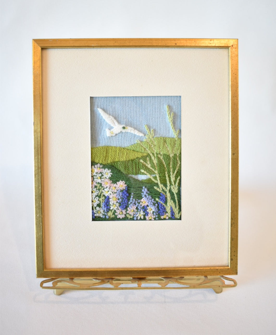 Framed Vintage Crewel Embroidery – White Bird in Flight over Floral Hills
