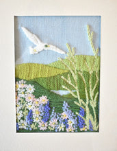 Load image into Gallery viewer, Framed Vintage Crewel Embroidery – White Bird in Flight over Floral Hills
